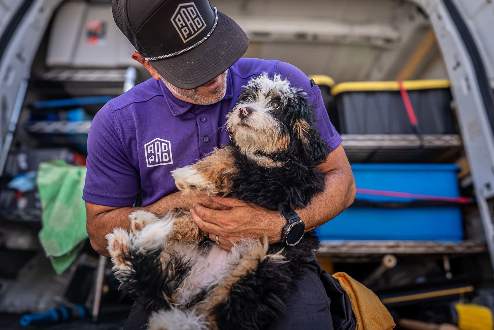 RadPad's founder seated with his dog