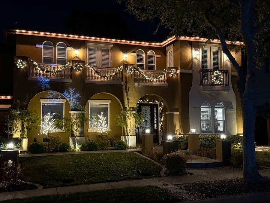 Holiday lights framing the entry of a San Diego home