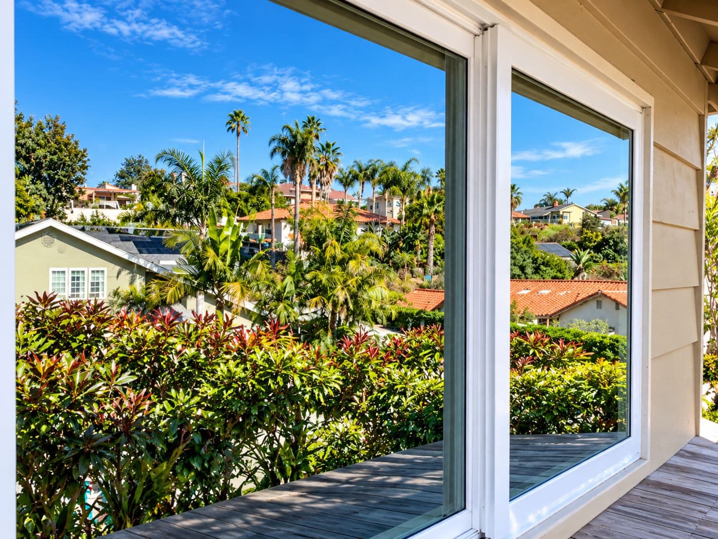 Spotless patio glass looking out over a garden