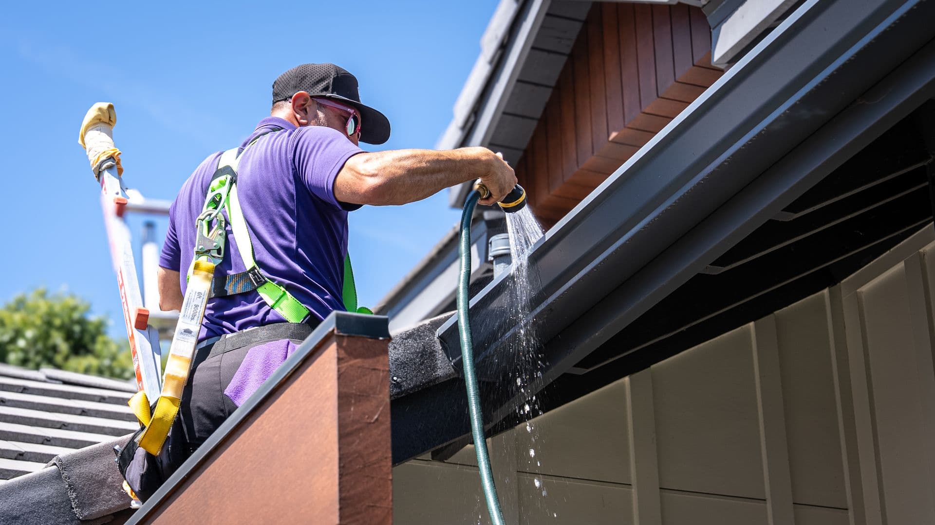 RadPad technician clearing a residential gutter run