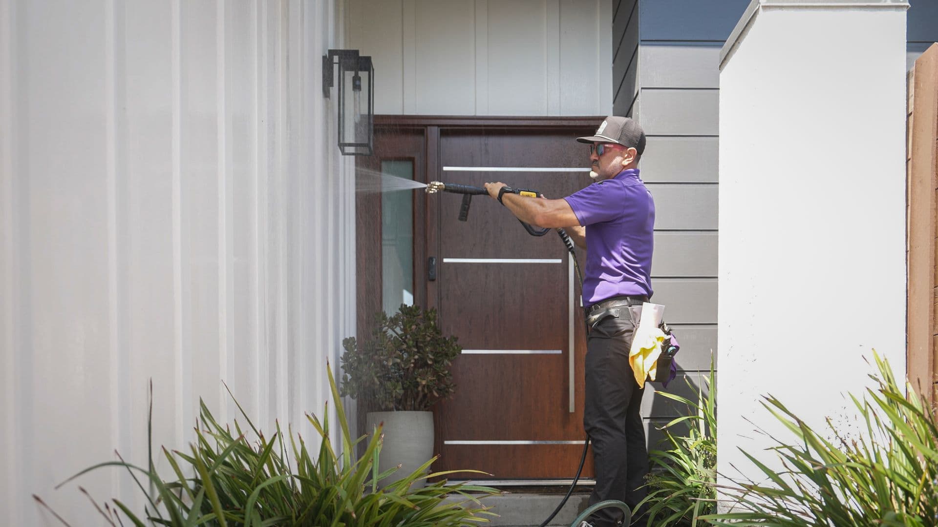 Soft washing a home entry and siding