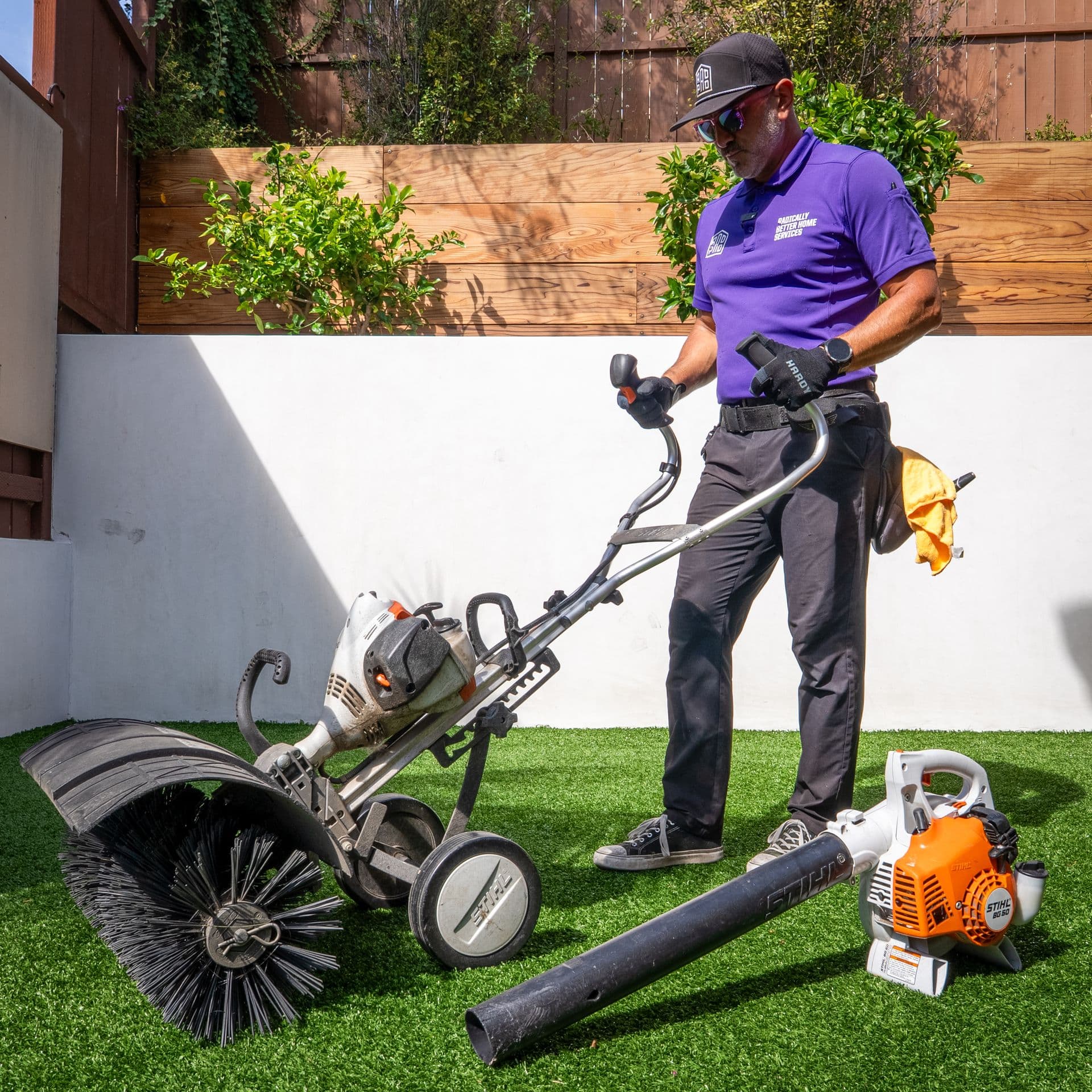 RadPad power-brooming and grooming an artificial turf lawn
