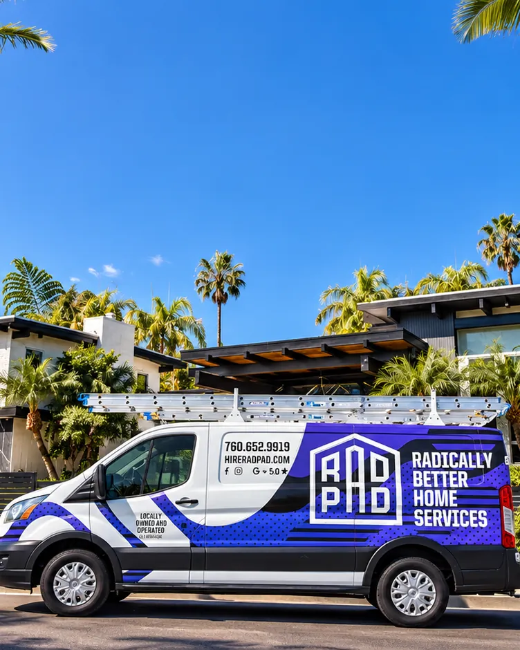 The RadPad service van parked outside a San Diego home lined with palm trees